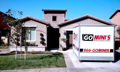 Go Mini's portable storage unit on a residential driveway